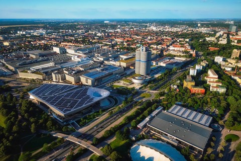 MUNICH, GERMANY, JULY 08, 2018: Aerial view of BMW Museum and BWM Welt and factory and Munich from