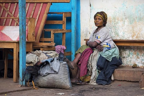 Poor Malagasy homeless woman in the city Ambalavao, Haute Matsiatra, Madagascar, Southeast Africa,