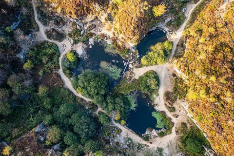 Top Down over Haytor Quarry from a drone, Haytor Rocks, Dartmoor Park, Devon, England, United