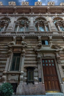 Detailed view of the courtyard façade of the Palazzo della Borsa, built between 1907 and 1912, in