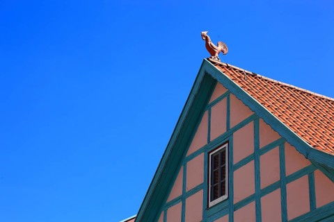 Ummerstadt in the district of Hildburghausen, red cock as ridge turret on a half-timbered house on
