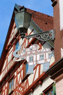 Lamp, old lamp, painted tin elephant, sign, stamped part, shop sign, inn sign, half-timbered
