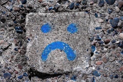 Smiley, emoji on a house wall, sad face, Denmark, Europe