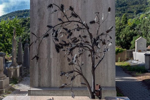 Metal sculpture on a grave, Monumental Cemetery, Cimitero monumentale di Staglieno), Genoa, Italy,