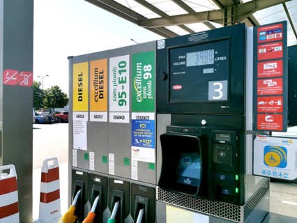 Petrol pump with nozzles for petrol and diesel at a motorway filling station in France, Automatic