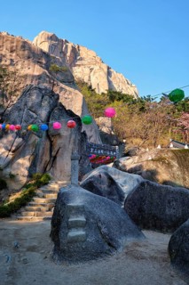 SEORAKSAN, SOUTH KOREA, APRIL 15, 2017: Kyejoam Seokgul Hermitage shrine and Ulsanbawi rock in
