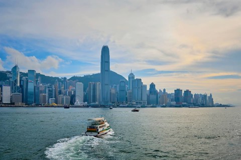 HONG KONG, CHINA, MAY 1, 2018: Hong Kong skyline cityscape downtown skyscrapers over Victoria