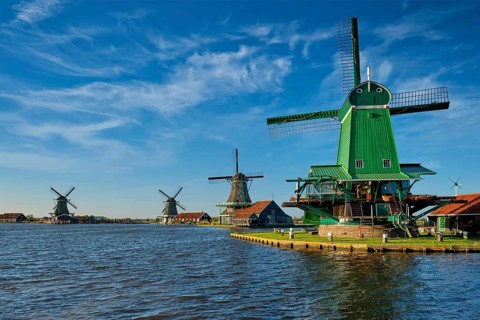 Netherlands rural lanscape Windmills at famous tourist site Zaanse Schans in Holland. Zaandam,