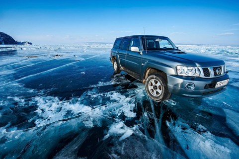 Car on ice, Lake Baikal, Olkhon Island, Pribaikalsky National Park, Irkutsk Province, Siberia,