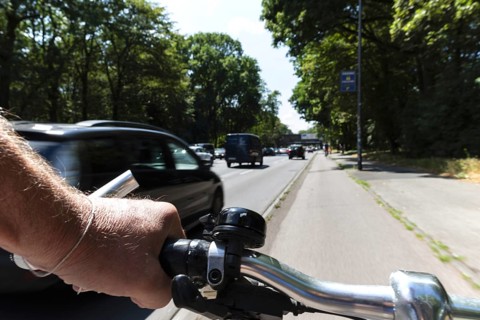 Cycling from a first-person perspective on a cycle path in Cologne, North Rhine-Westphalia,