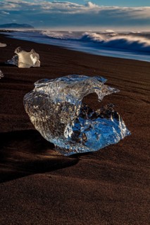 Ice floes on the beach in the evening light, sea, Breidamerkursandur, Jökulsarlon, south-east