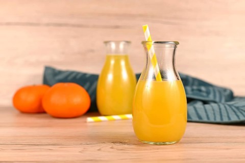 Homemade lemonade made from citrus fruits in jars