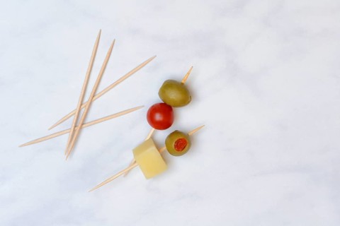 Stuffed olives on toothpicks, green olive