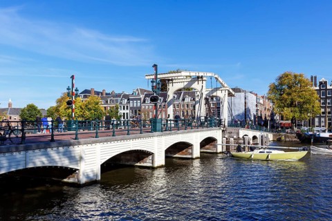 Magere Brug canal bridge on the Amstel in the city of Amsterdam, Netherlands