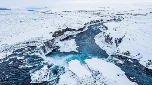 Godafoss waterfall, snowy landscape, drone shot, Northern Iceland Eyestra, Iceland, Europe