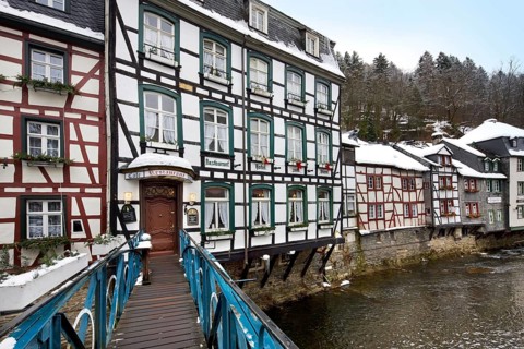 Historic half-timbered houses along the Rur near Monschau, Eifel, North Rhine-Westphalia, Germany,