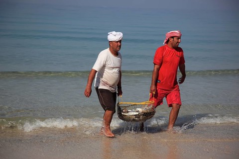 Fishermen on the Arabian Gulf, near Tibat, in the Omani enclave of Musandam, Oman, Asia