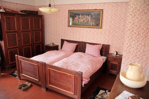 Bedroom in the Henneberg Open Air Museum near Veßra Monastery, Hildburghausen County, Thuringia,