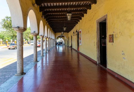 Colonnaded walkway on main square, Spanish colonial architecture, Valladolid, Yucatan, Mexico,