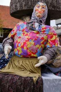 Witch figures at the fountain, decoration for Walpurgis Night, Braunlage, Harz, Lower Saxony,