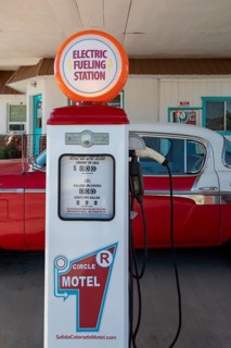 Salida, Colorado, An electric car charging station., made from gasoline pumps, at the Circle R