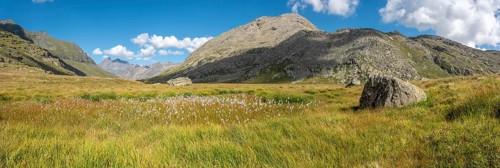 Valley in the rocky mountains of the Italian Alps in the Gran Paradiso National Park. Panoramic