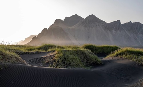 Black beach with volcanic sand, sandy beach, dunes with grass, Stokksnes headland, Klifatindur
