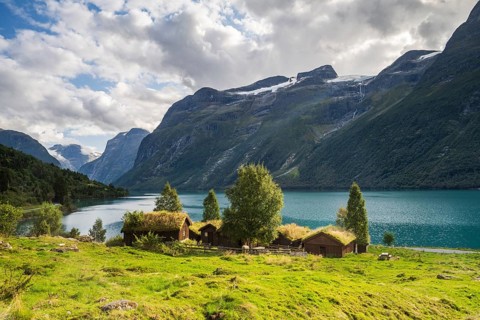 Traditional cabins on the shores of Lake Lovatnet, Breng seter, Loen, Stryn, Norway, Europe