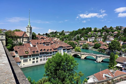 View of the old town of Bern, Nydegg church, Untertorbrücke bridge on the River Aare, Nydegg
