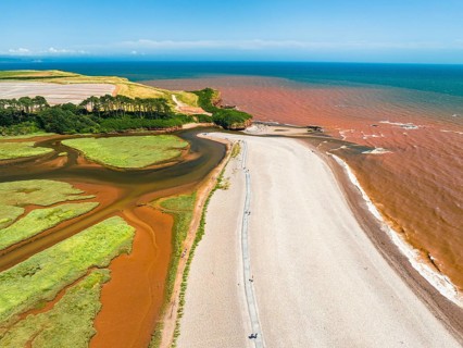 River Otter Estuary Nature Reserve from a drone, Budleigh Salterton Beach, Devon, England, United