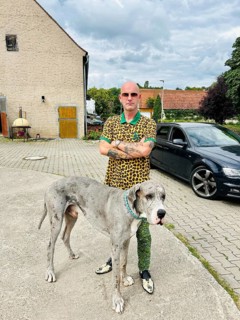 Young man with a Great Dane, Bavaria, Germany, Europe