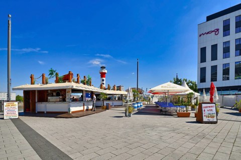 Ludwigshafen am Rhein, Germany, August 2022: Food booths selling street food at Rhine river