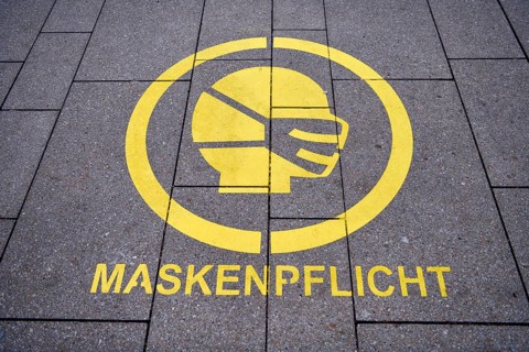 Notice on mask obligation on a pavement at Jungfernstieg, Covid, Corona, Hamburg, Germany, Europe