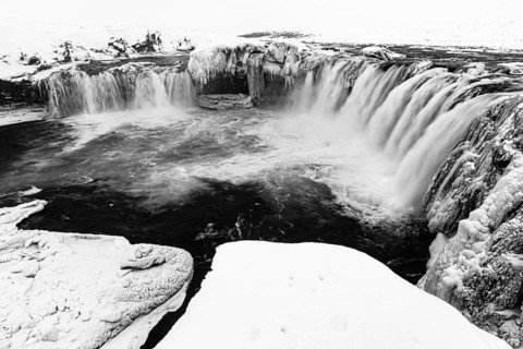 Godafoss waterfall, icy and snowy rock face, black and white photo, Northern Iceland Eyestra,