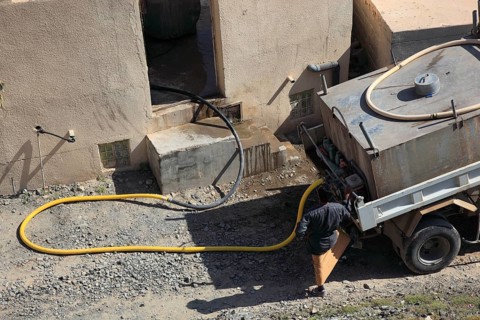 Drinking water delivery by truck in Bahla. The oasis town of Bahla is one of the oldest royal towns