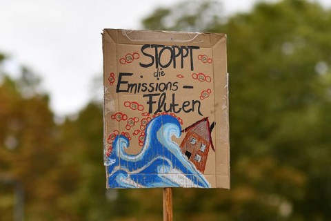 Heidelberg, Germany, 24th September 2021: Sign saying 'Stop emission floods' in German during