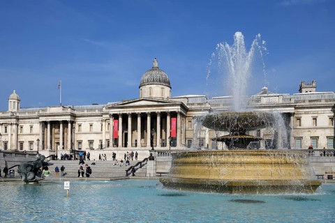 Fountain in Trafalgar Square, National Gallery in the background, Westminster, London, England,