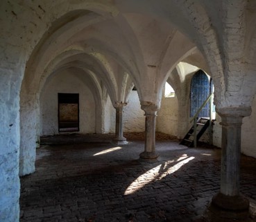 Fine brick arched vaulting of 14th century refectory undercroft, St Olaves priory, Norfolk,