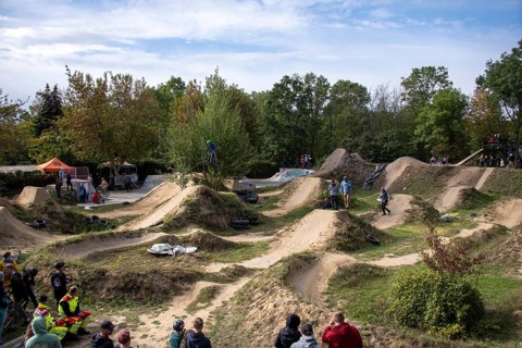 Young people jumping over mounds with BMX bikes, sport dirt jump, Magdeburg, Saxony-Anhalt,
