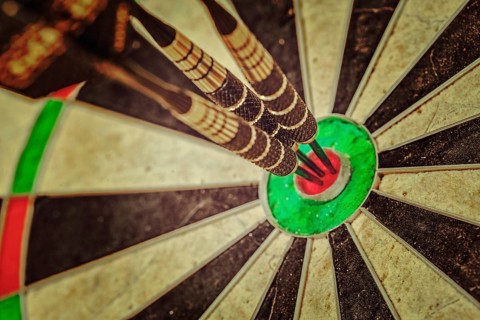 Vintage retro effect filtered hipster style image of, Success hitting target aim goal achievement