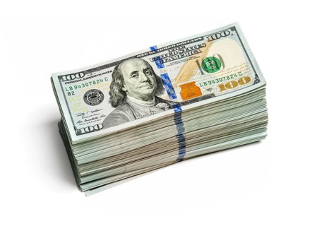 Creative business finance making money concept, stack of bundles of 100 US dollars 2013 edition