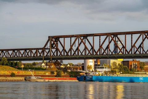 The railway bridge Duisburg-Hochfeld-Rheinhausen, over the Rhine, regional trains and many goods