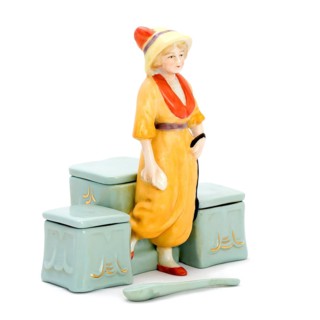 Antique porcelain boxes for cosmetics with figurines. Isolated picture
