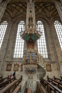 Pulpit with sandstone staircase in the late Gothic hall church of St George, Dinkelsbühl, Bavaria,