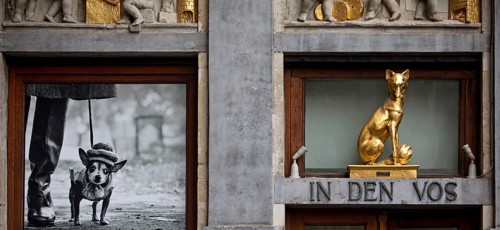 Baroque façade detail of the Guildhall In den Vox with photo exhibition by Elliott Erwitt,