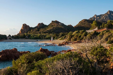 Lonely picturesque beach and red rocks, Spiaggia Su Sirboni, sunrise, near Tertenia, Province of