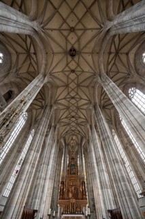 Interior with net vault and high altar in the late Gothic hall church of St George, Dinkelsbühl,