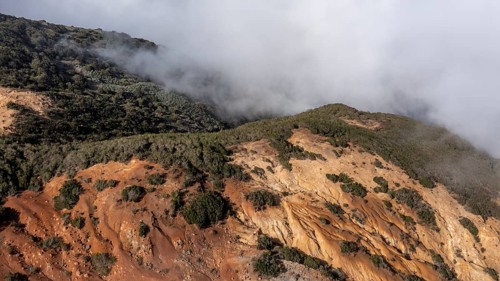 Clouds of fog, yellow earth, erosion, near Arguamul, La Gomera, Canary Islands, Spain, Europe