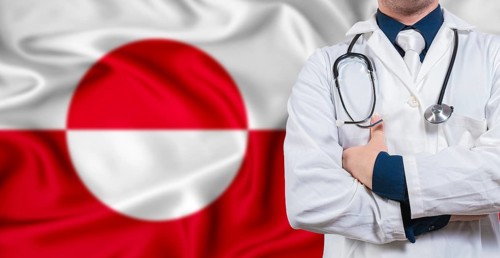 Male doctor with stethoscope on Greenland flag. Doctor holding stethoscope on Greenland flag