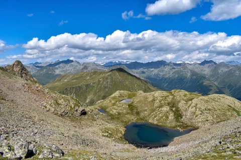 View from the Weiße Spitze to the mountain lakes on the way from the Brugger Alm, on the horizon